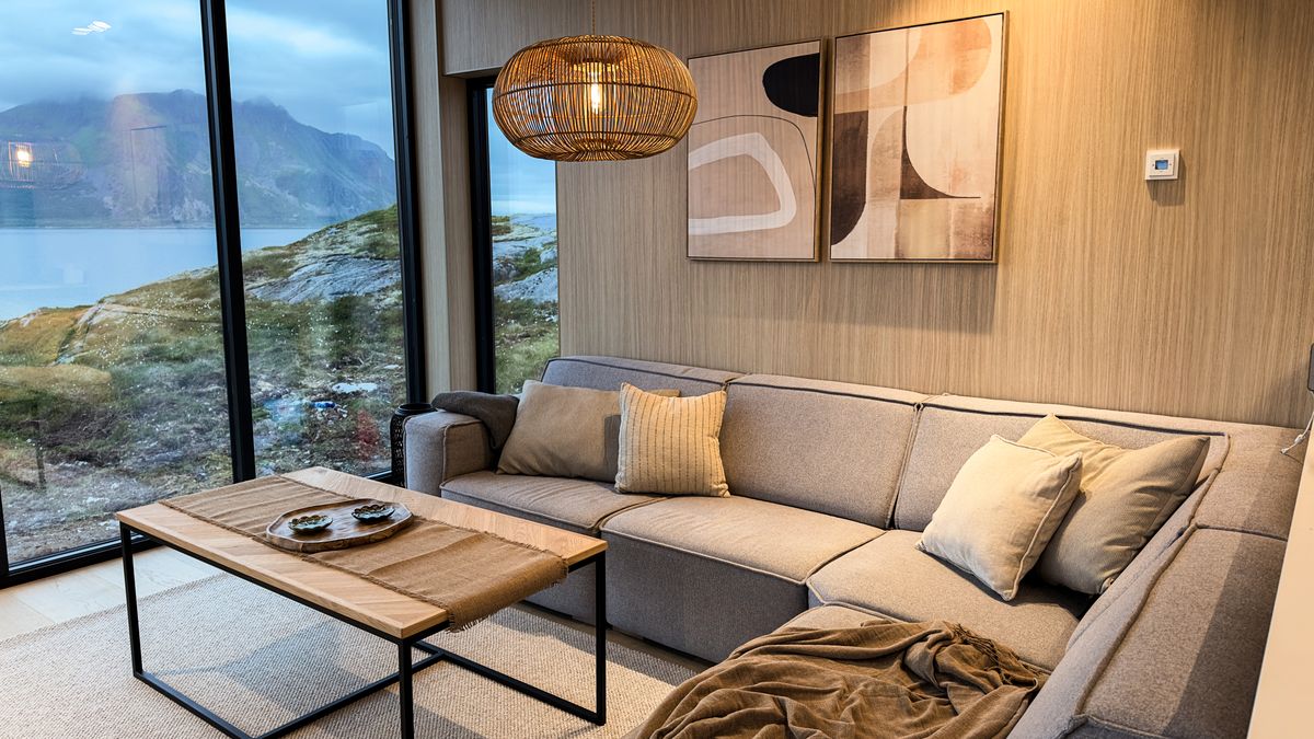 Large sofa in Lyngvær facing the windows and the water